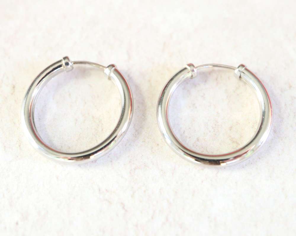 18 mm White Gold Capped Hoop Earrings